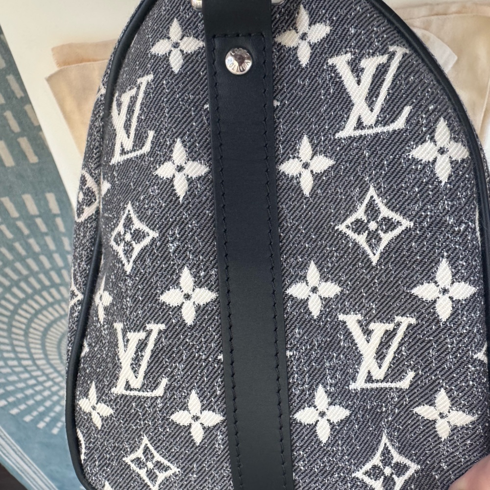 I lowered the price to sell  
Louis Vuitton Black and Gray Monogram Speedy 25 - Picture 14 of 16